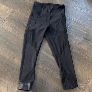 Lululemon Black High-Waisted Capri Leggings with netting size 4